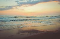 Beach and sea at sunset.