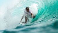 Surfer in the tube.