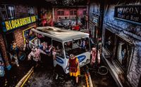 Doomtown at Tulleys Shocktober Fest, shows a milk van in an alley full of zombies.