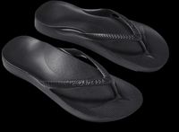 A pair of Archies flip flops, in black.