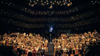 Large crowd in an indoor theatre at the Sheffield DocFest.