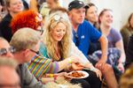 Festival-goers seated together during a small food and wellbeing session at The Big Retreat.