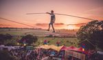 Performer walking a tight rope at Shindig Festival 2017.