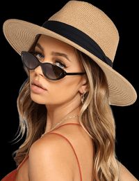 Woman wearing a Furtalk sun hat, wide brim, panama style, woman is wearing sunglasses.