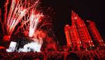 On the Waterfront Festival photo at night, pyrotechnics on the stage with Liverpool clock tower in the background.