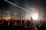 Night-time crowd facing the heart-shaped stage and laser show at Love Saves The Day 2026. Photograph: Elliot Hingston.