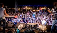 Crowd at Deva Fest Festival enjoying a music performance.