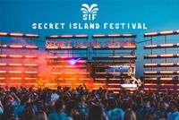 Secret Island Festival, very cool photo showing crowd facing a secret island dj.