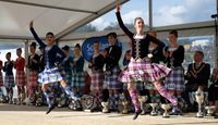 Two Scottish Highland dancers.